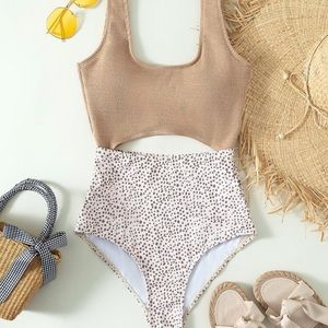 One piece spotted bathing suit